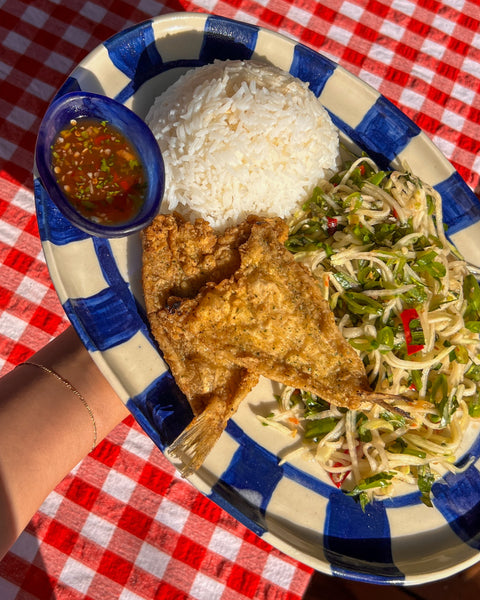 Vietnamese style fried fish with rice, slaw and tamarind dipping sauce